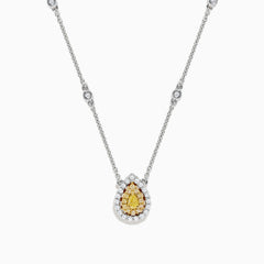 The Canare 18K Two-Tone Gold Yellow and White Diamond Necklace (0.69 TCW) features a teardrop pendant with a yellow gemstone encircled by white diamonds, set on a gold chain accented with spaced round gemstones.