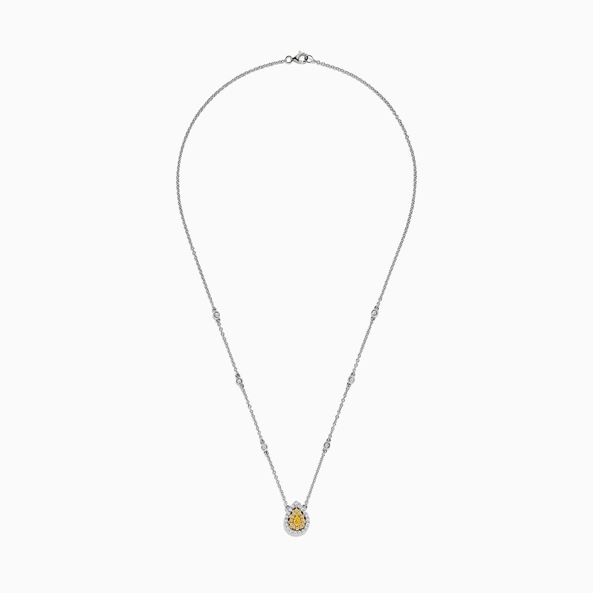 The Canare 18K Two-Tone Gold Yellow and White Diamond Necklace (0.69 TCW) features a teardrop pendant with a yellow gemstone encircled by white diamonds, set on a gold chain accented with spaced round gemstones.