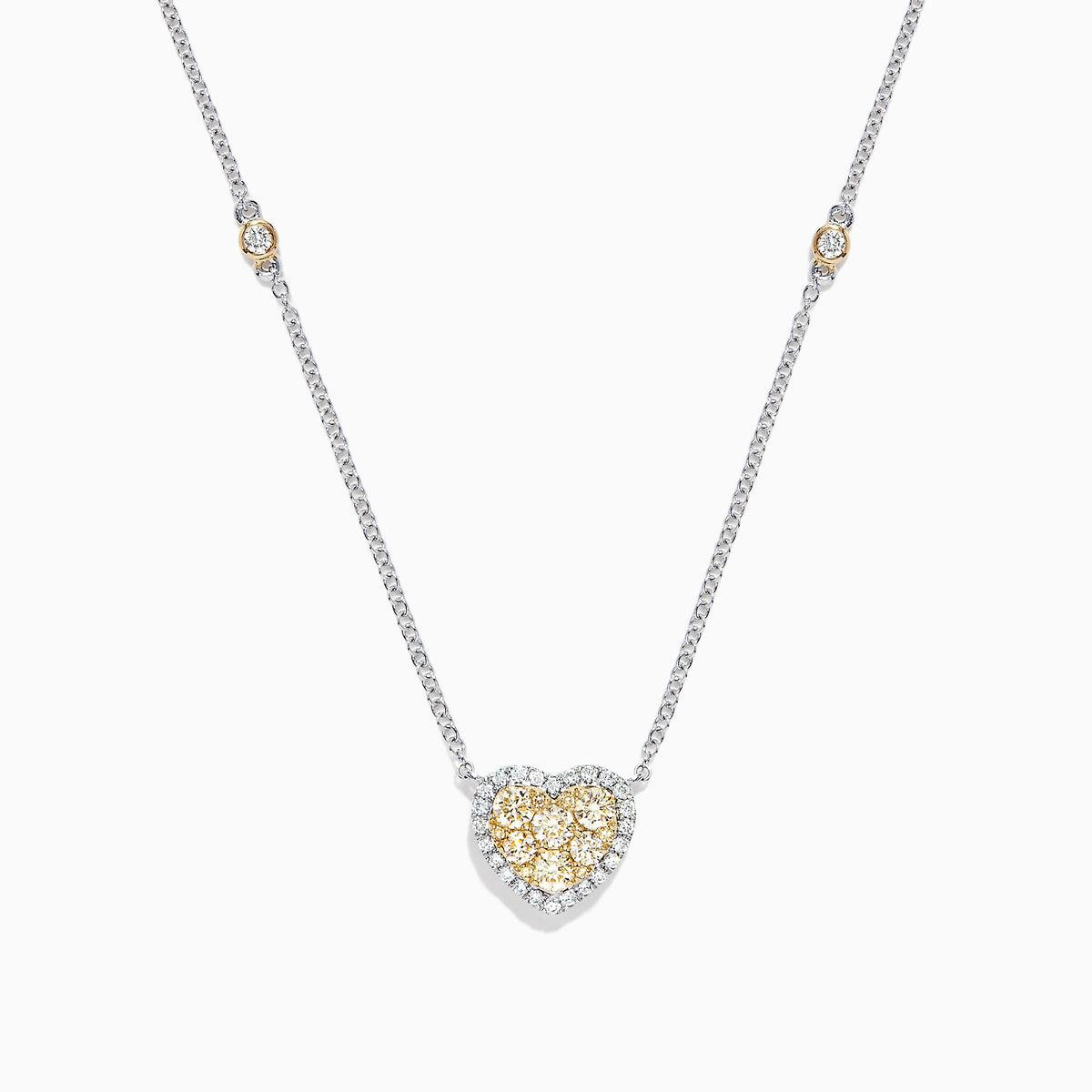 The Canare 14K Two Tone Gold Yellow Diamond Heart Necklace (0.71 TCW) features a heart-shaped pendant with yellow and white gemstones and two small round accents on the chain—adding elegance with a touch of Yellow Diamond sparkle.