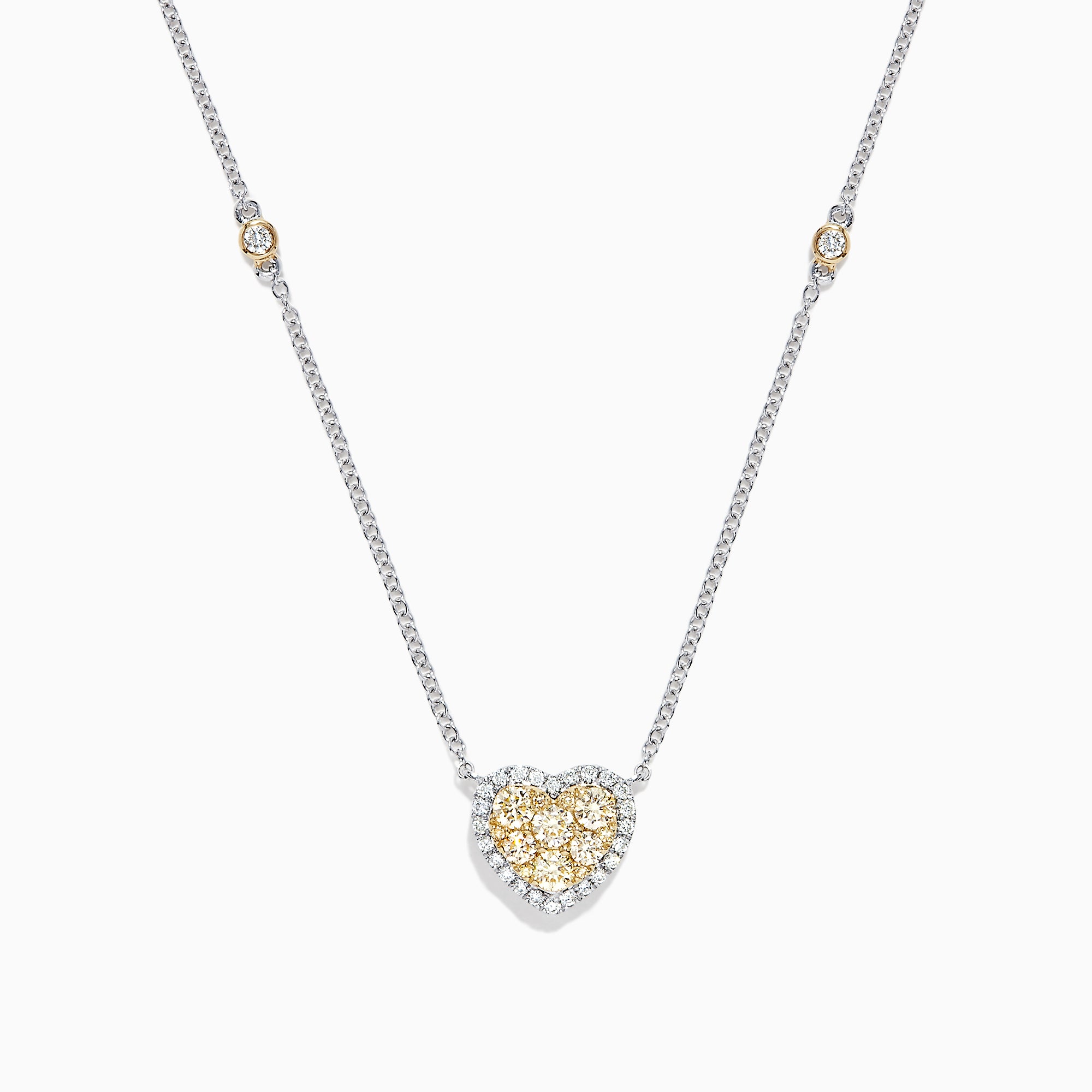 The Canare 14K Two Tone Gold Yellow Diamond Heart Necklace (0.71 TCW) features a heart-shaped pendant with yellow and white gemstones and two small round accents on the chain—adding elegance with a touch of Yellow Diamond sparkle.