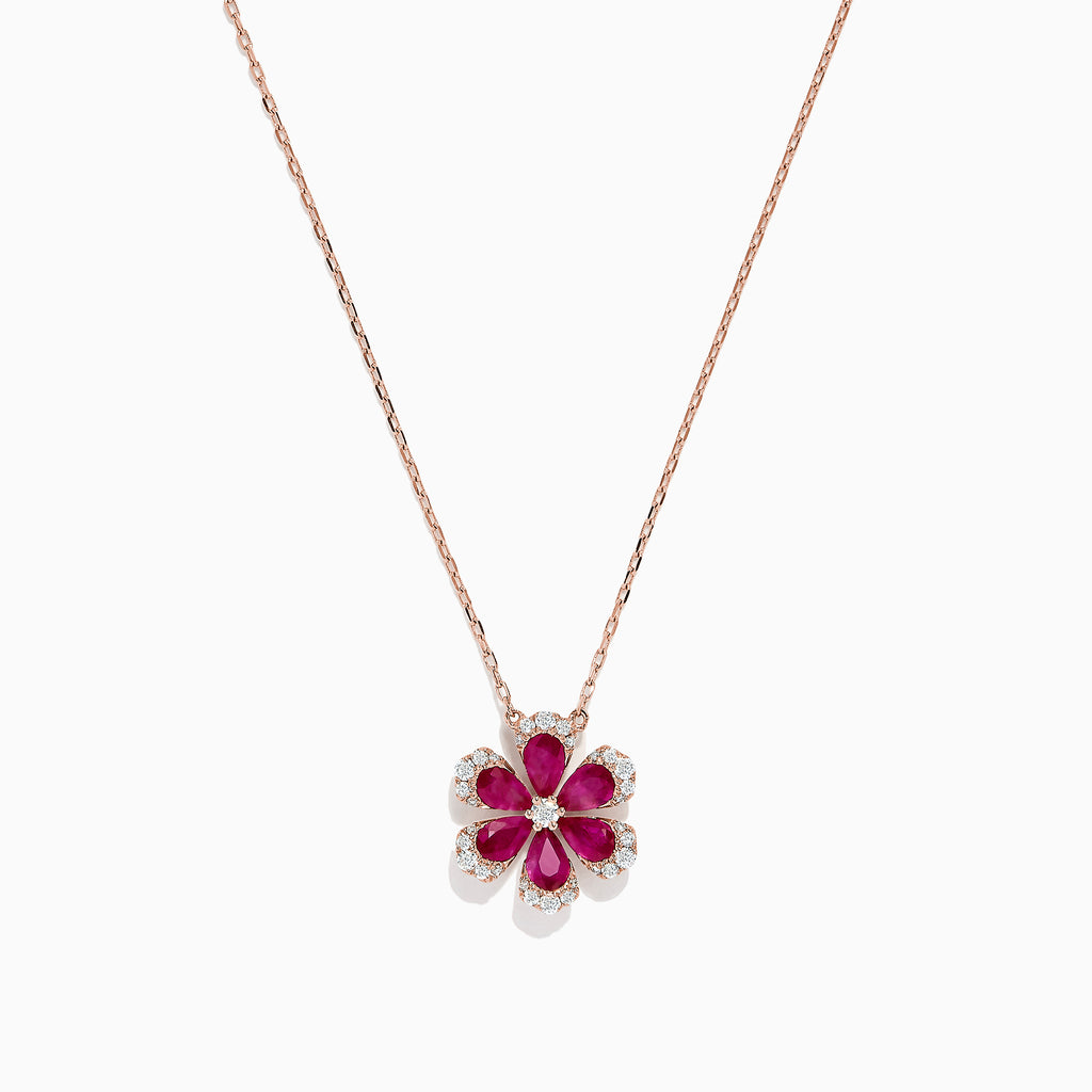 The Nature 14K Rose Gold Ruby and Diamond Flower Necklace (1.91 TCW) features a flower pendant with six ruby petals, each outlined by sparkling diamonds.