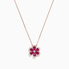 The Nature 14K Rose Gold Ruby and Diamond Flower Necklace (1.91 TCW) features a flower pendant with six ruby petals, each outlined by sparkling diamonds.