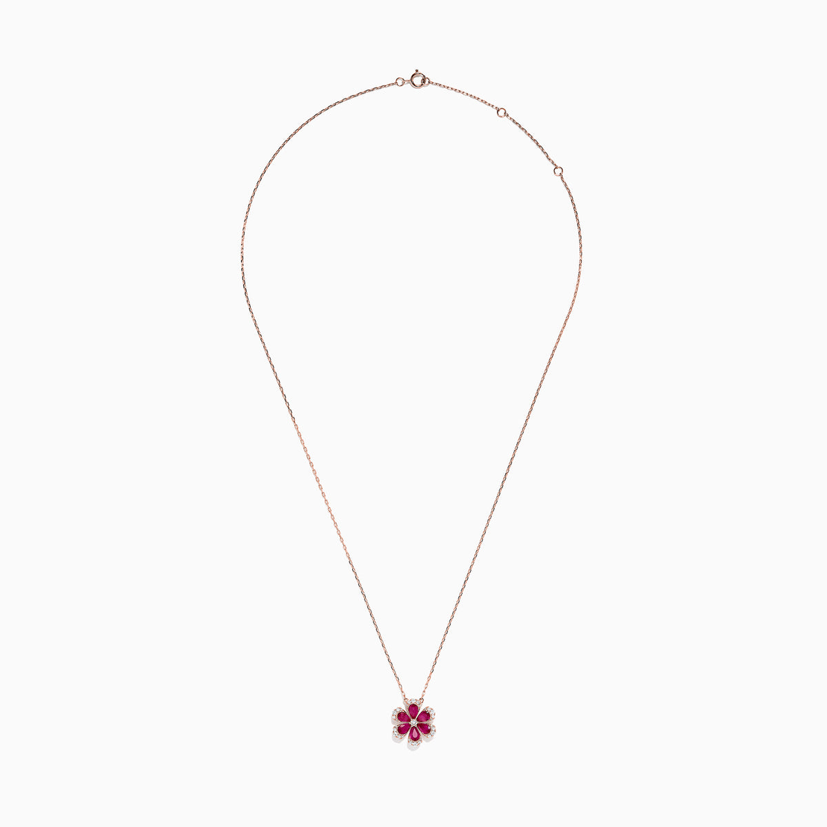 The Nature 14K Rose Gold Ruby and Diamond Flower Necklace (1.91 TCW) features a flower pendant with six ruby petals, each outlined by sparkling diamonds.