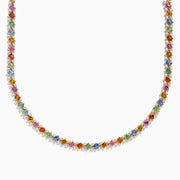 The Watercolors 14K Yellow Gold Multi Sapphire and Diamond Necklace features a symmetrical pattern of blue, pink, orange, green, and yellow square-cut sapphires set in yellow gold.