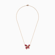 The Ruby Royale 14K Rose Gold Ruby and Diamond Bow Necklace (2.97 TCW) features a bow-shaped pendant adorned with vivid rubies and sparkling diamonds, suspended from a delicate rose gold chain against a white background.