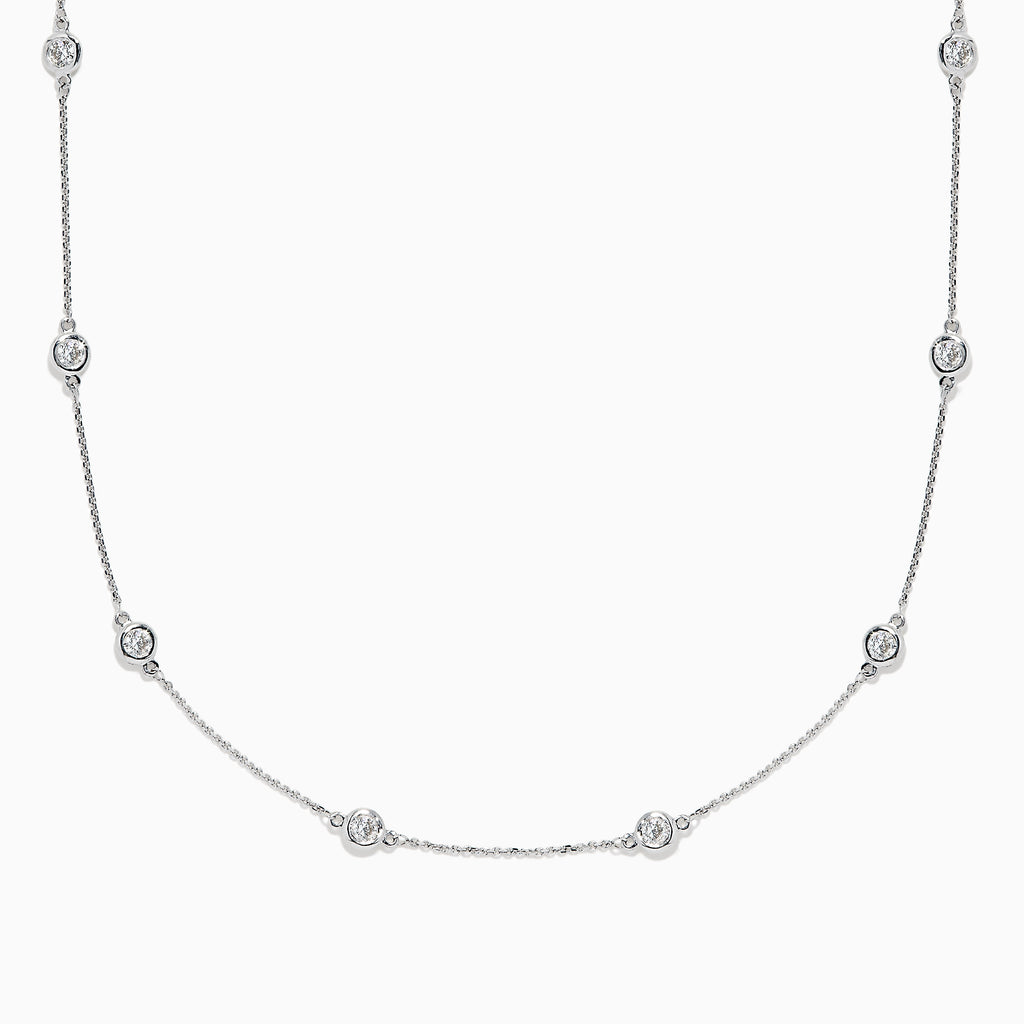 The Pave Classica 14K White Gold Diamond Station Necklace, 1.50 TCW, features small round bezel-set diamonds evenly spaced along a fine chain and is displayed against a white background.