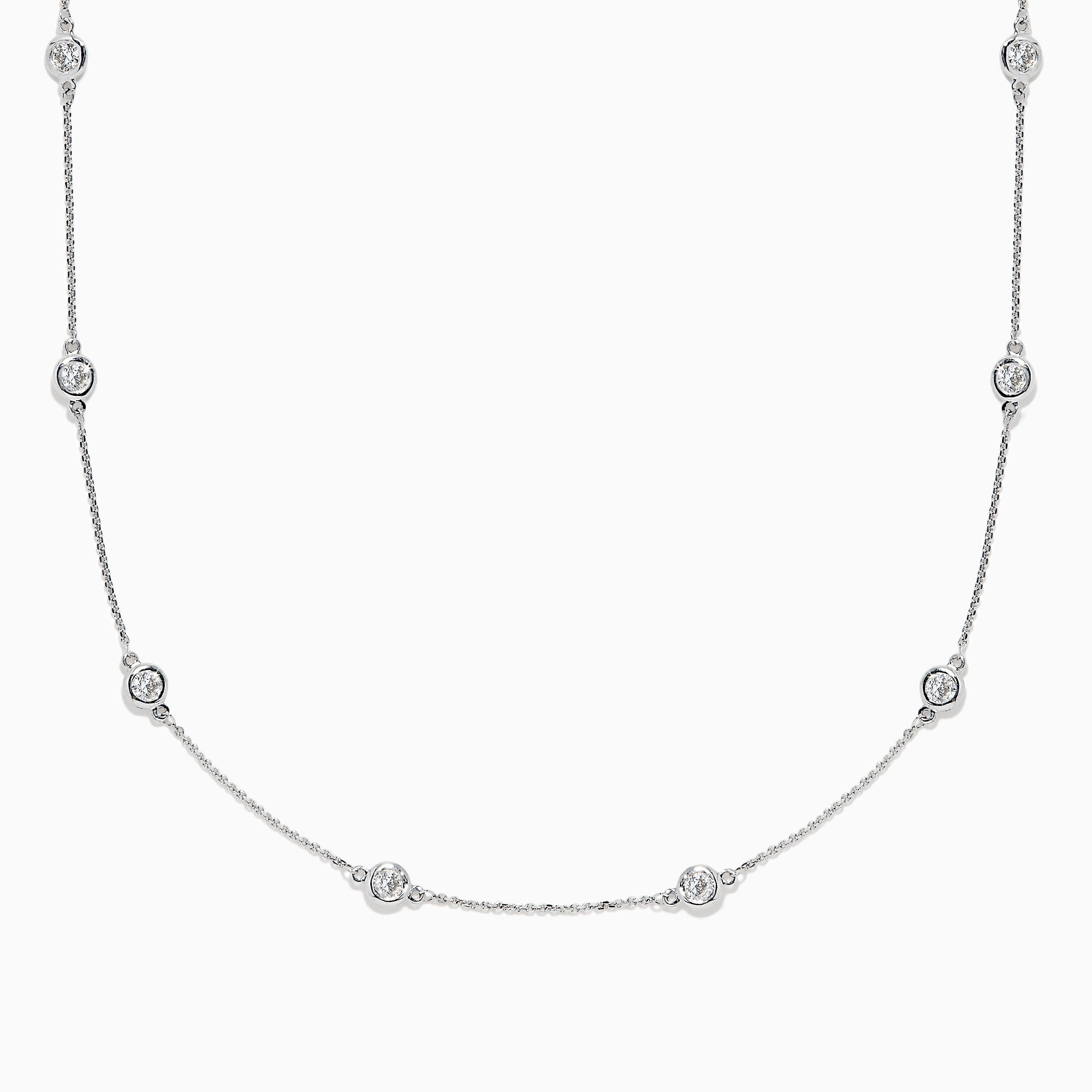 The Pave Classica 14K White Gold Diamond Station Necklace, 1.50 TCW, features small round bezel-set diamonds evenly spaced along a fine chain and is displayed against a white background.
