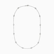 The Pave Classica 14K White Gold Diamond Station Necklace, 1.50 TCW, features small round bezel-set diamonds evenly spaced along a fine chain and is displayed against a white background.