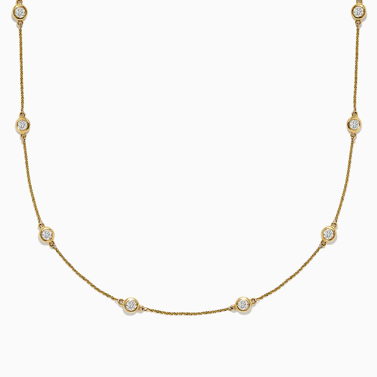 The D’Oro 14K Yellow Gold Diamond Station Necklace features evenly spaced bezel-set diamonds totaling 1.50 TCW, each set in a small gold frame along the chain, displayed on a plain white background.