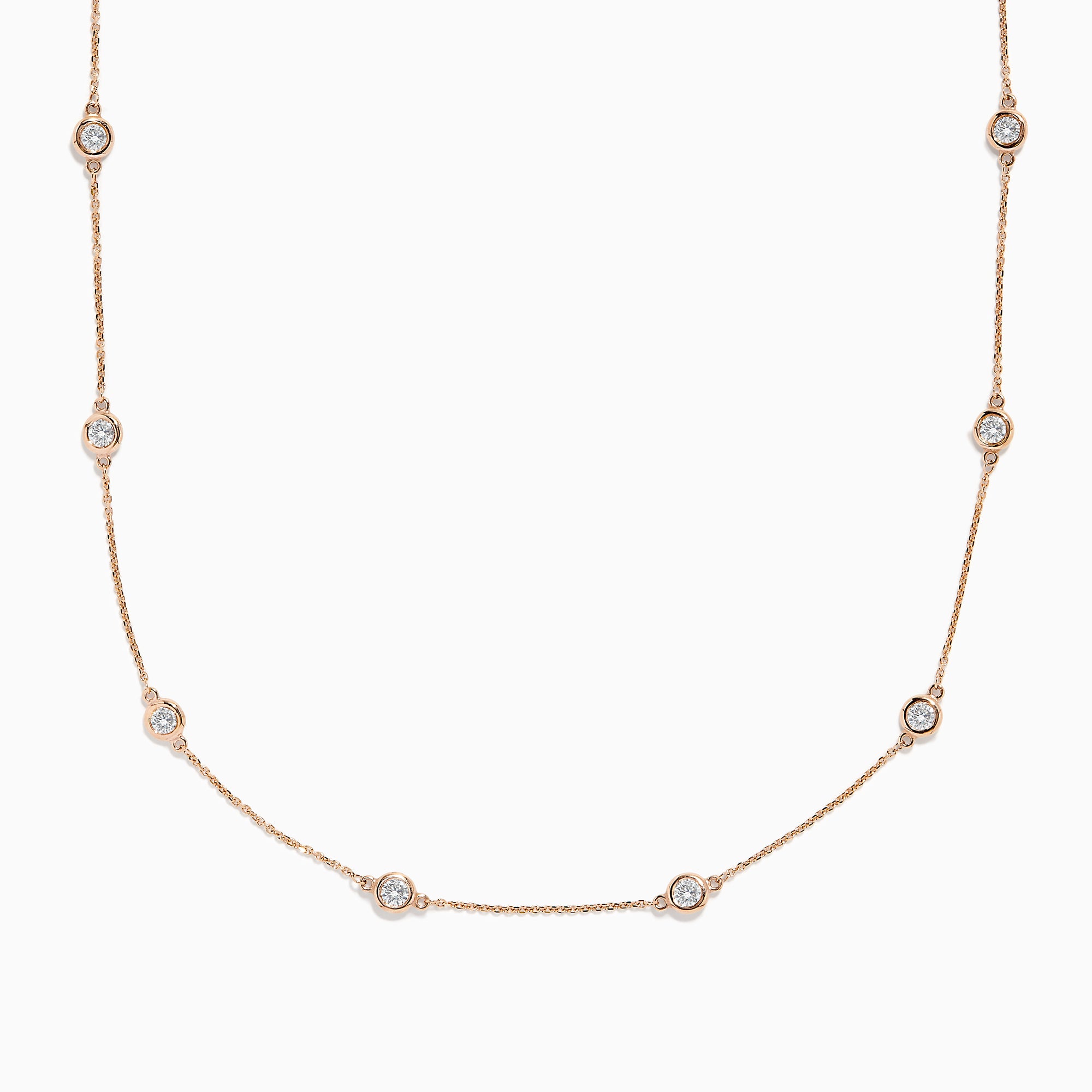 The Pave Rose 14K Rose Gold Diamond Station Necklace 1.50 TCW features evenly spaced round bezel-set diamonds on a rose gold chain, offering timeless elegance and sparkle to any outfit.