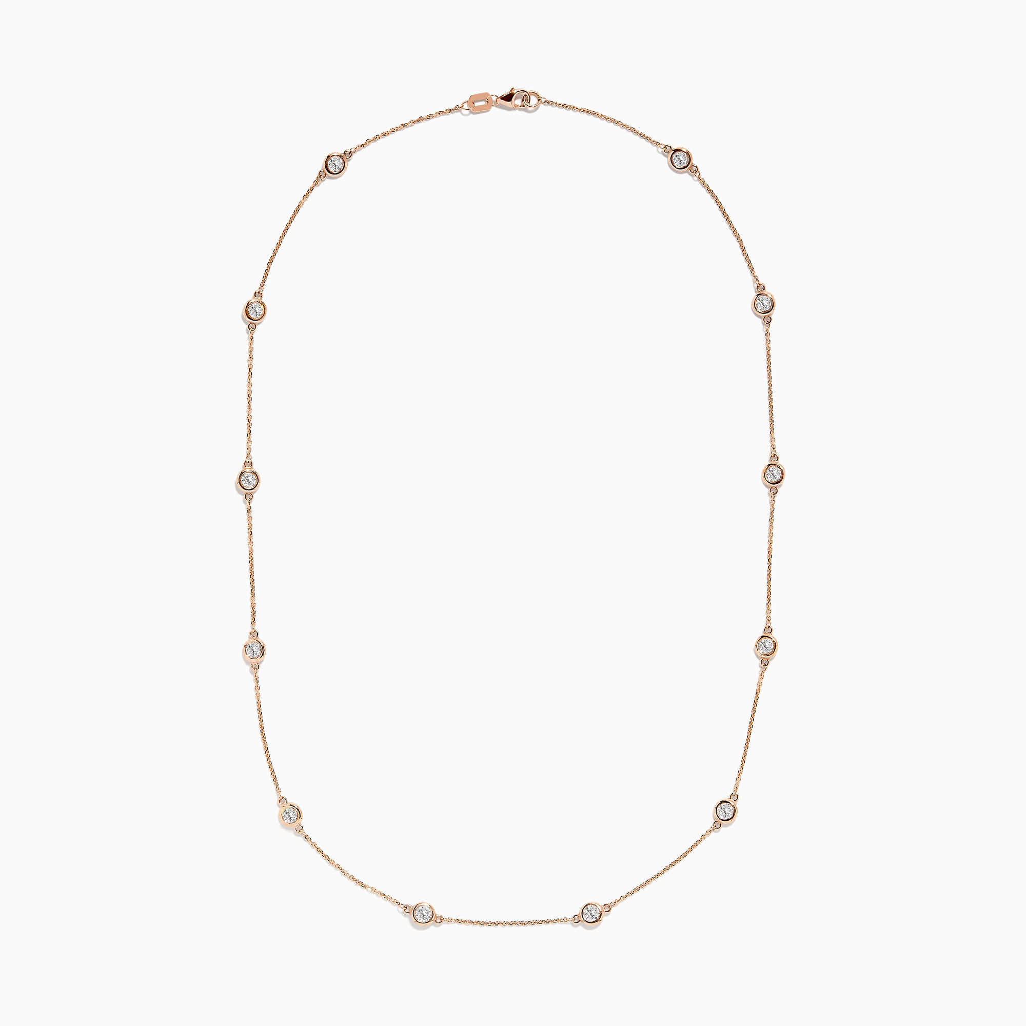 The Pave Rose 14K Rose Gold Diamond Station Necklace 1.50 TCW features evenly spaced round bezel-set diamonds on a rose gold chain, offering timeless elegance and sparkle to any outfit.