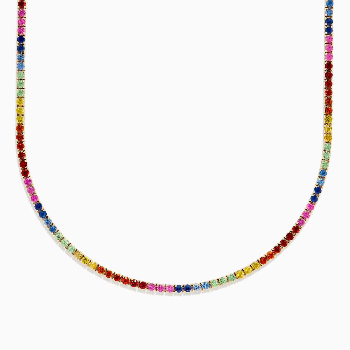 The Watercolors 14K Yellow Gold Multi Sapphire Tennis Necklace features small, round sapphires in a rainbow pattern, elegantly set in yellow gold and arranged in a smooth curve.