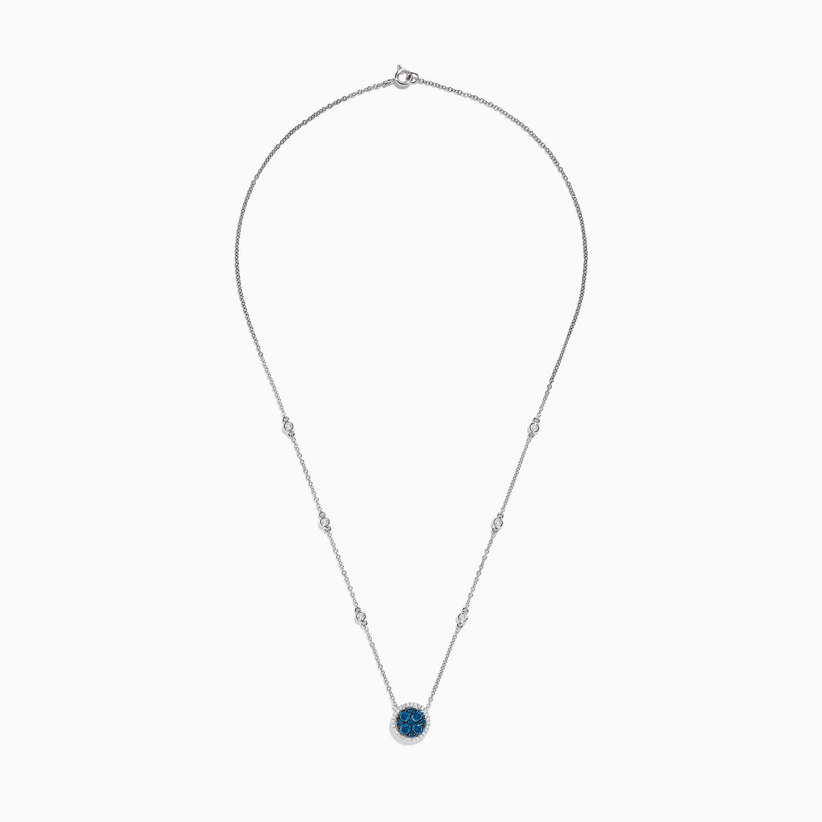 The Bella Bleu 14K White Gold White and Blue Diamond Stationary Necklace features a circular pendant with clustered blue diamonds surrounded by white diamonds, and a chain accented with additional sparkling white diamonds.