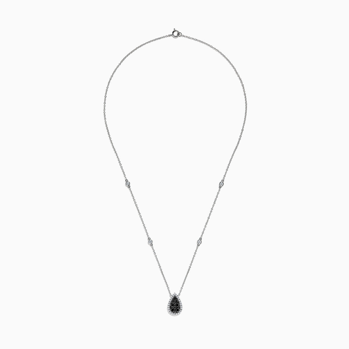 The 14K White Gold Black and White Diamond Pear Shaped Necklace, 1.09 TCW, features a teardrop pendant with black and white diamonds at the center, haloed by clear stones, plus two small clear stones set along the chain.