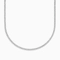 The Pave Classica 14K White Gold Diamond Tennis Necklace 10.51 TCW features small, round diamonds set closely in a continuous line, creating an elegant U-shape on a plain white background.