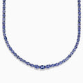A close-up of the Nahla Siri Sterling Silver Tanzanite Necklace, 27.69 TCW, showcasing a continuous strand of round, faceted blue tanzanite gemstones set symmetrically against a white background.