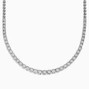 A 925 Sterling Silver Diamond Necklace, 0.31 TCW, showcases a continuous row of round white diamonds in a classic tennis style on a plain white background. Total carat weight available upon request.