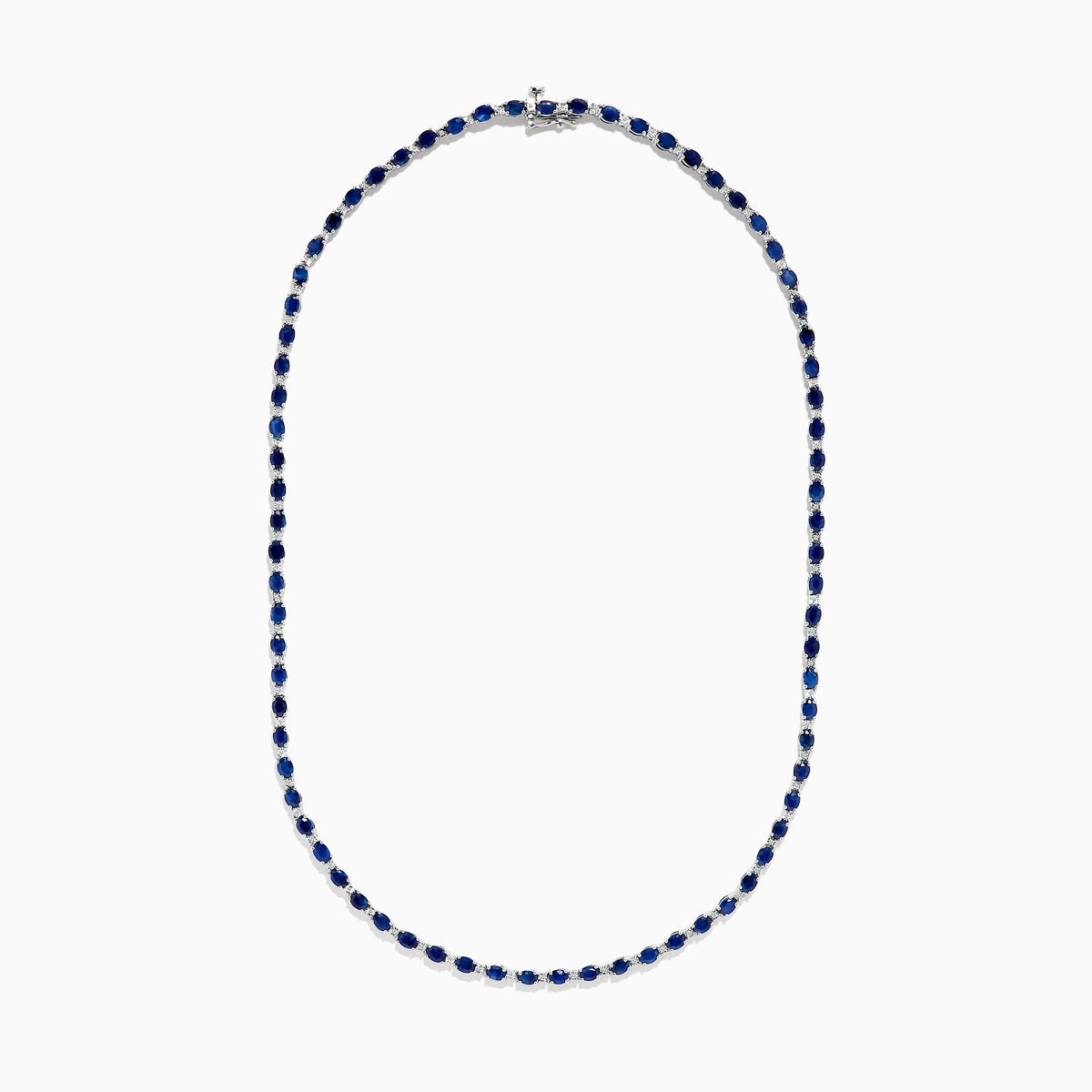 The 925 Sterling Silver Blue Sapphire Tennis Necklace features a continuous line of round blue sapphires set in sterling silver, creating a simple and elegant design.