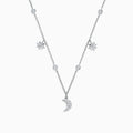 The Novelty 14K White Gold Diamond Moon and Stars Necklace, 0.38 TCW, features a crescent moon pendant and two star charms with sparkling diamonds, all elegantly set on a white gold chain for a celestial-inspired look.