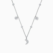 The Novelty 14K White Gold Diamond Moon and Stars Necklace, 0.38 TCW, features a crescent moon pendant and two star charms with sparkling diamonds, all elegantly set on a white gold chain for a celestial-inspired look.