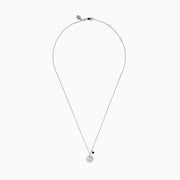 The Seaside Sterling Silver Sapphire and Diamond Anchor Necklace features a round, crystal-studded anchor pendant with a small dark blue sapphire charm, elegantly displayed on a white background.