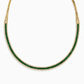 The Brasilica 14K Yellow Gold Emerald and Diamond Necklace features a row of square-cut emeralds with diamond accents along the edges, creating an elegant, symmetrical design. Shown against a white background.