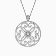 The Pave Classica 14K White Gold Diamond Pendant features a circular filigree design adorned with diamonds totaling 1.32 TCW, set in a delicate white gold pendant.
