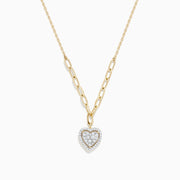 The Doro 14K Yellow Gold Diamond Heart Pendant Necklace features mixed-size chain links and a heart-shaped diamond pendant encrusted with sparkling diamonds, displayed on a white background.