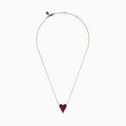 The Ruby Royale 14K Rose Gold Pave Ruby Heart Pendant Necklace features a heart-shaped pendant adorned with pave rubies and bordered by clear stones, set in an elegant rose gold setting.