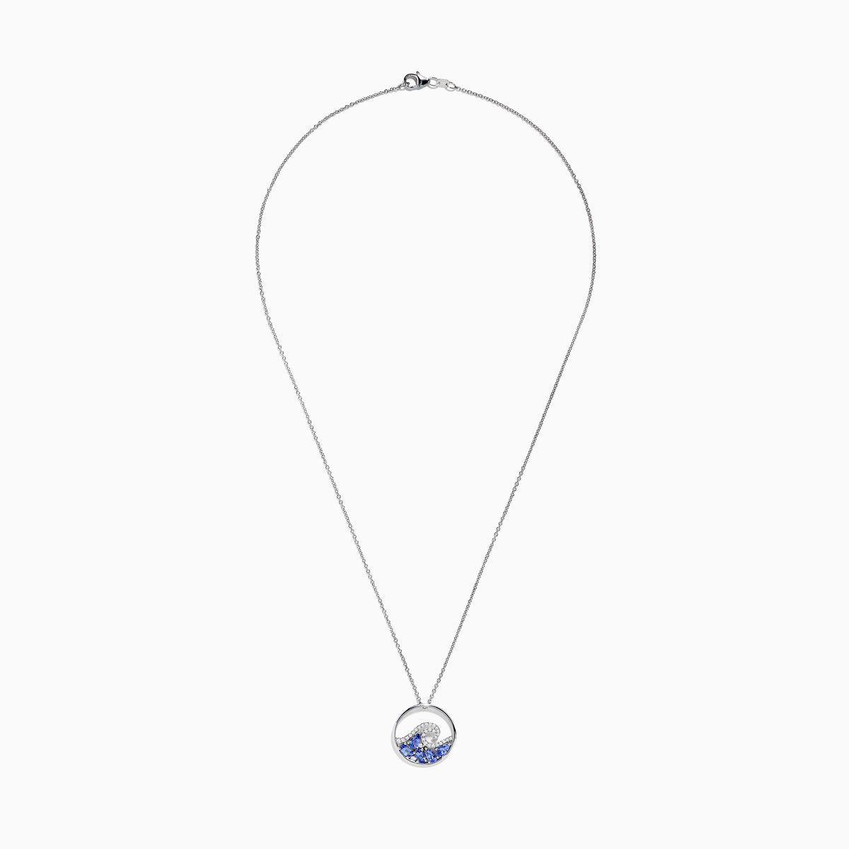The 925 Sterling Silver Tanzanite and Diamond Wave Pendant features a circular wave design with sparkling blue tanzanite and clear gemstones on a delicate chain, offering an elegant, ocean-inspired look.
