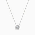 The Pave Classica 14K White Gold Diamond Pendant (0.49 TCW) by Effy features a brilliant round diamond surrounded by a halo of smaller diamonds, elegantly set on a simple white gold chain and showcased against a white background.