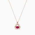 The Seaside 14K Rose Gold Ruby and Diamond Crab Pendant features a ruby-red oval gemstone body and sparkling white stones outlining the crab’s claws and shell, all on a delicate rose gold necklace.