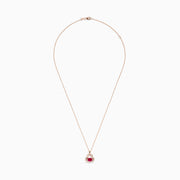 The Seaside 14K Rose Gold Ruby and Diamond Crab Pendant features a thin rose gold chain and a crab-shaped pendant adorned with a large ruby center surrounded by sparkling diamonds.