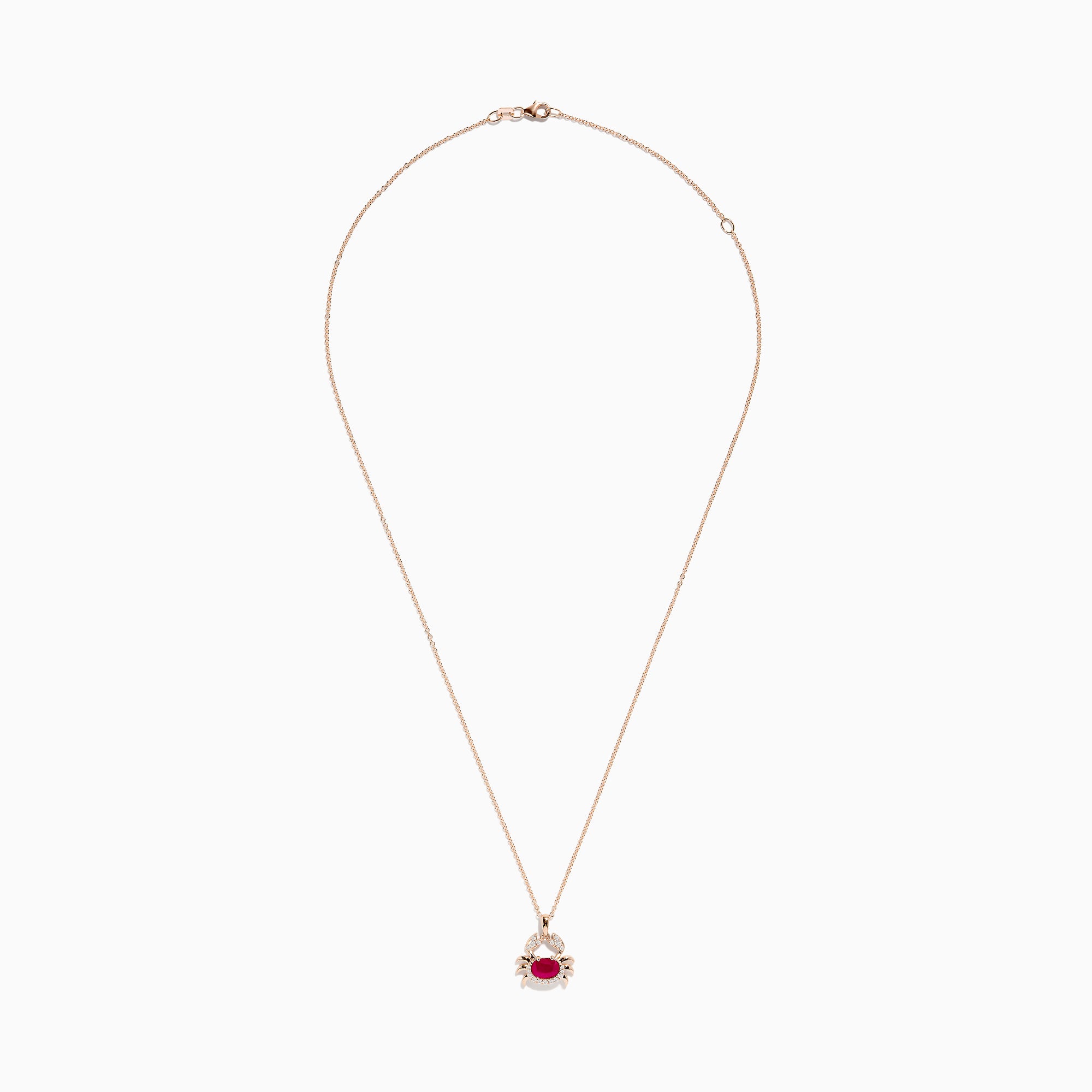 The Seaside 14K Rose Gold Ruby and Diamond Crab Pendant features a thin rose gold chain and a crab-shaped pendant adorned with a large ruby center surrounded by sparkling diamonds.