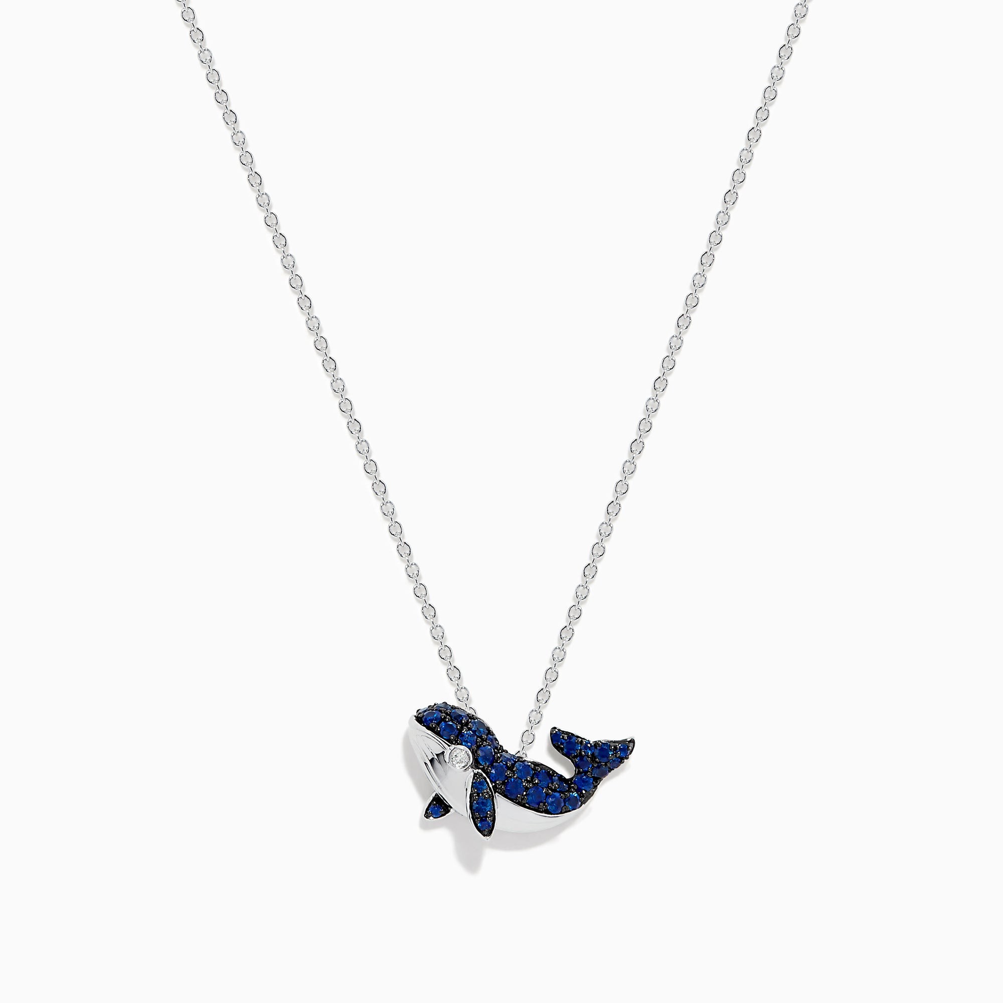 A 14K white gold necklace featuring a whale-shaped pendant adorned with sapphires and diamonds, suspended on a delicate chain.
