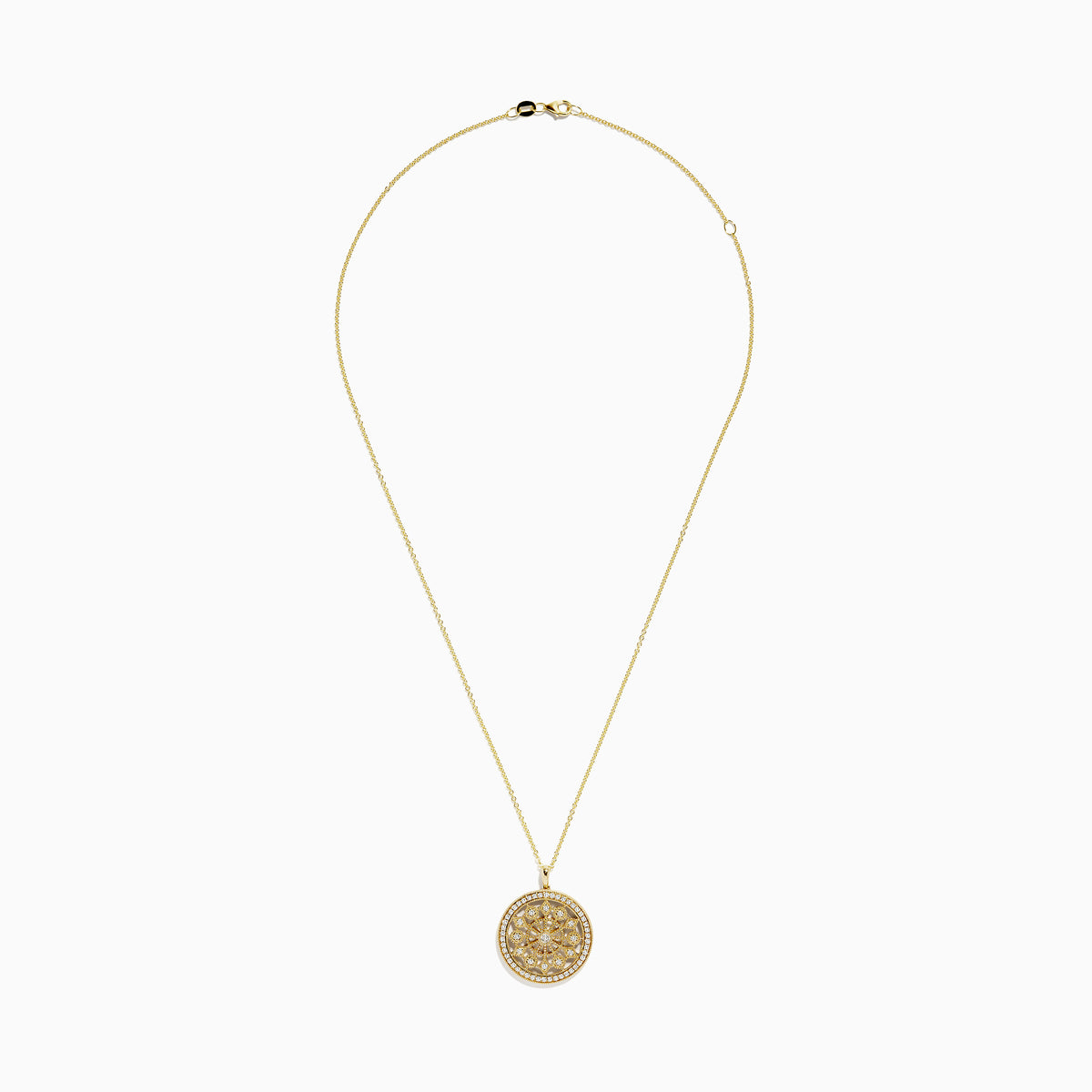 The DOro 14K Yellow Gold Diamond Mandala Pendant features a circular design with an intricate, symmetrical floral pattern set with sparkling white diamonds.