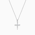 A delicate silver necklace features the Novelty 14K White Gold Diamond Cross Pendant, 0.30 TCW, adorned with sparkling diamonds and set against a plain white background.
