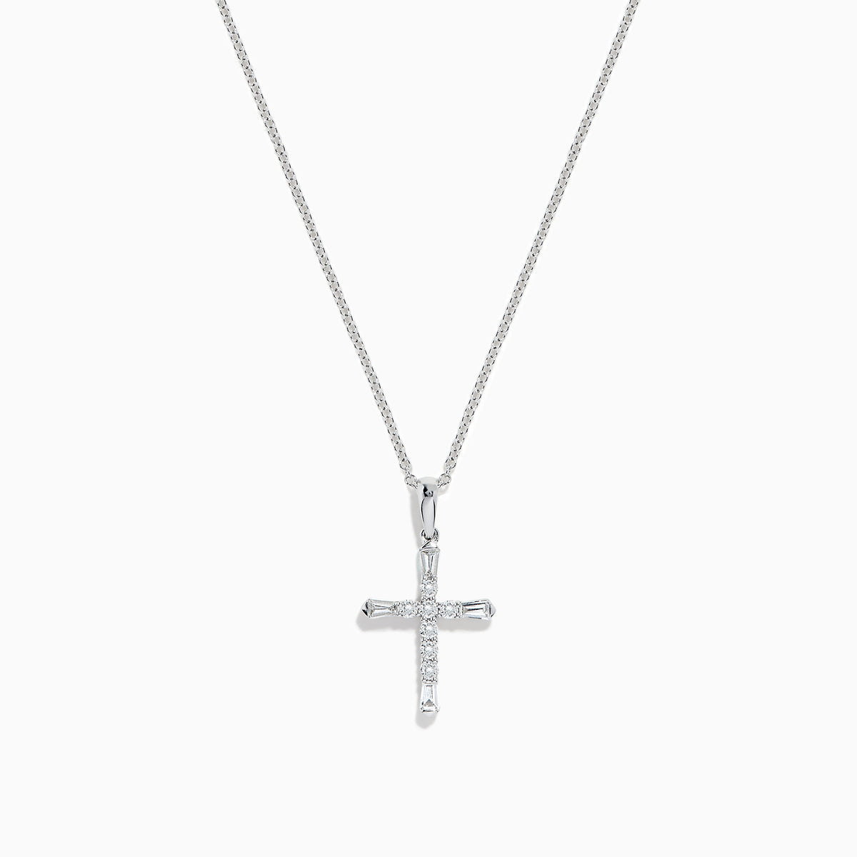 A delicate silver necklace features the Novelty 14K White Gold Diamond Cross Pendant, 0.30 TCW, adorned with sparkling diamonds and set against a plain white background.