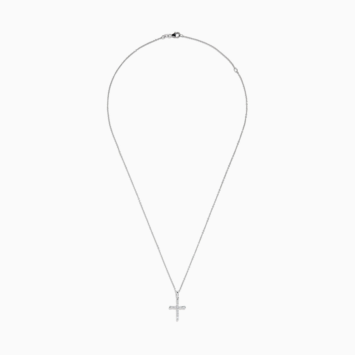 A delicate silver necklace features the Novelty 14K White Gold Diamond Cross Pendant, 0.30 TCW, adorned with sparkling diamonds and set against a plain white background.