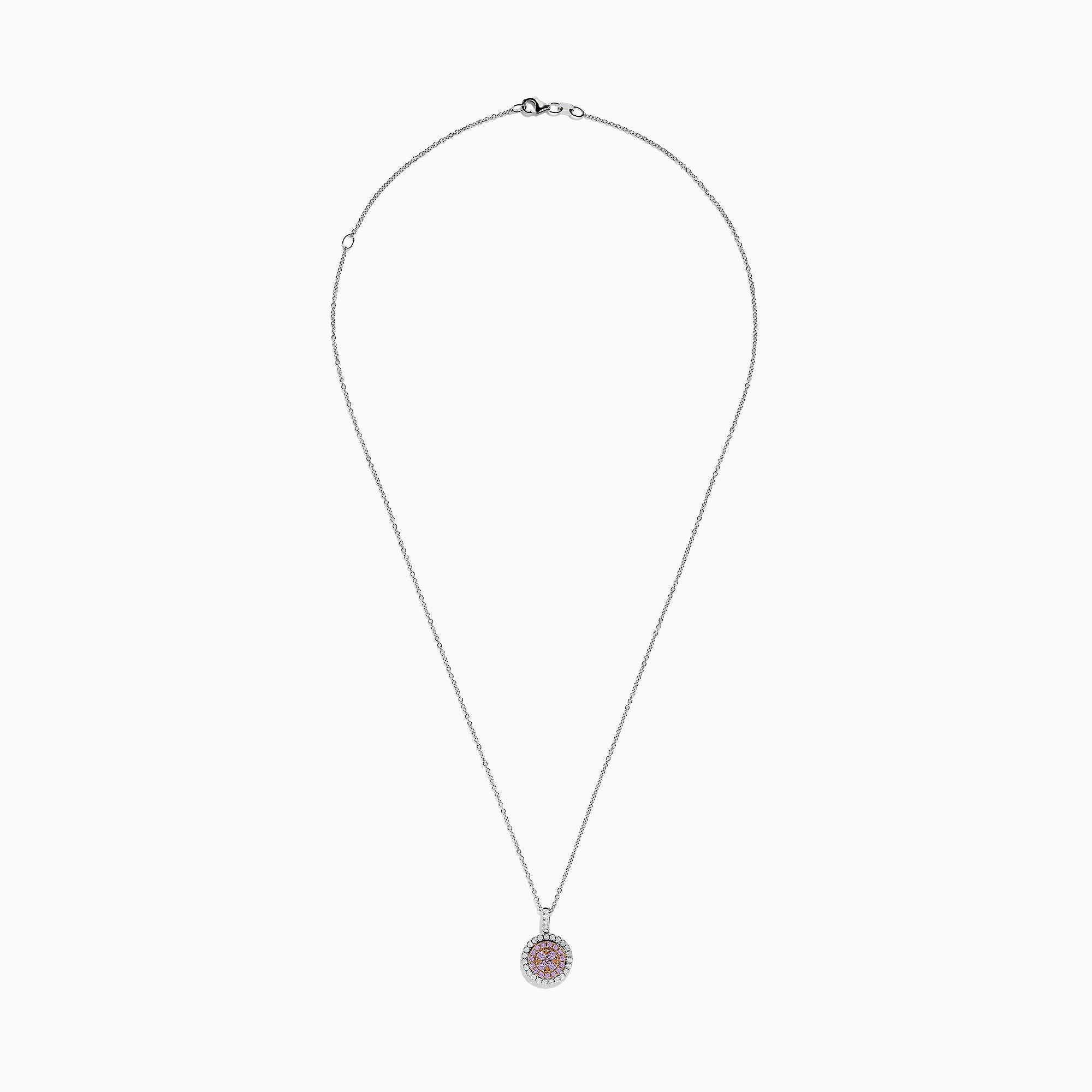 The 14K Two Tone Gold Pink and White Diamond Pendant (0.54 TCW) combines pink center stones with a double halo of sparkling diamonds for an elegant, eye-catching look reminiscent of a classic diamond pendant.