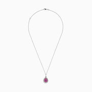 The 14K Two Tone Gold Pink Sapphire and Diamond Pendant, 1.74 TCW, features a pear-shaped pink sapphire surrounded by clear and yellow stones in a halo design, blending diamond-like elegance with stylish two-tone gold accents.