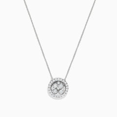 The 14K White Gold Diamond Necklace, 0.72 TCW, features a round pendant with a central cluster and halo of sparkling diamonds by Effy, shown against a plain white background.