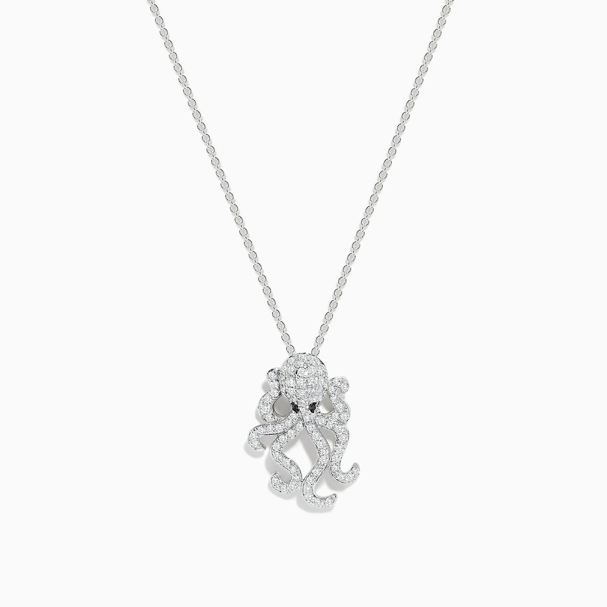 A delicate Effy Seaside 14K White Gold Diamond Octopus Pendant, adorned with sparkling white diamonds and two black stones for eyes.
