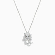 A delicate Effy Seaside 14K White Gold Diamond Octopus Pendant, adorned with sparkling white diamonds and two black stones for eyes.