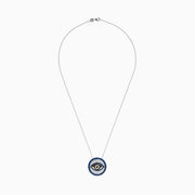 The Novelty 14K Two Tone Gold Sapphire and Diamond Evil Eye Pendant features a round evil eye design with sparkling sapphires and diamonds for a striking look.