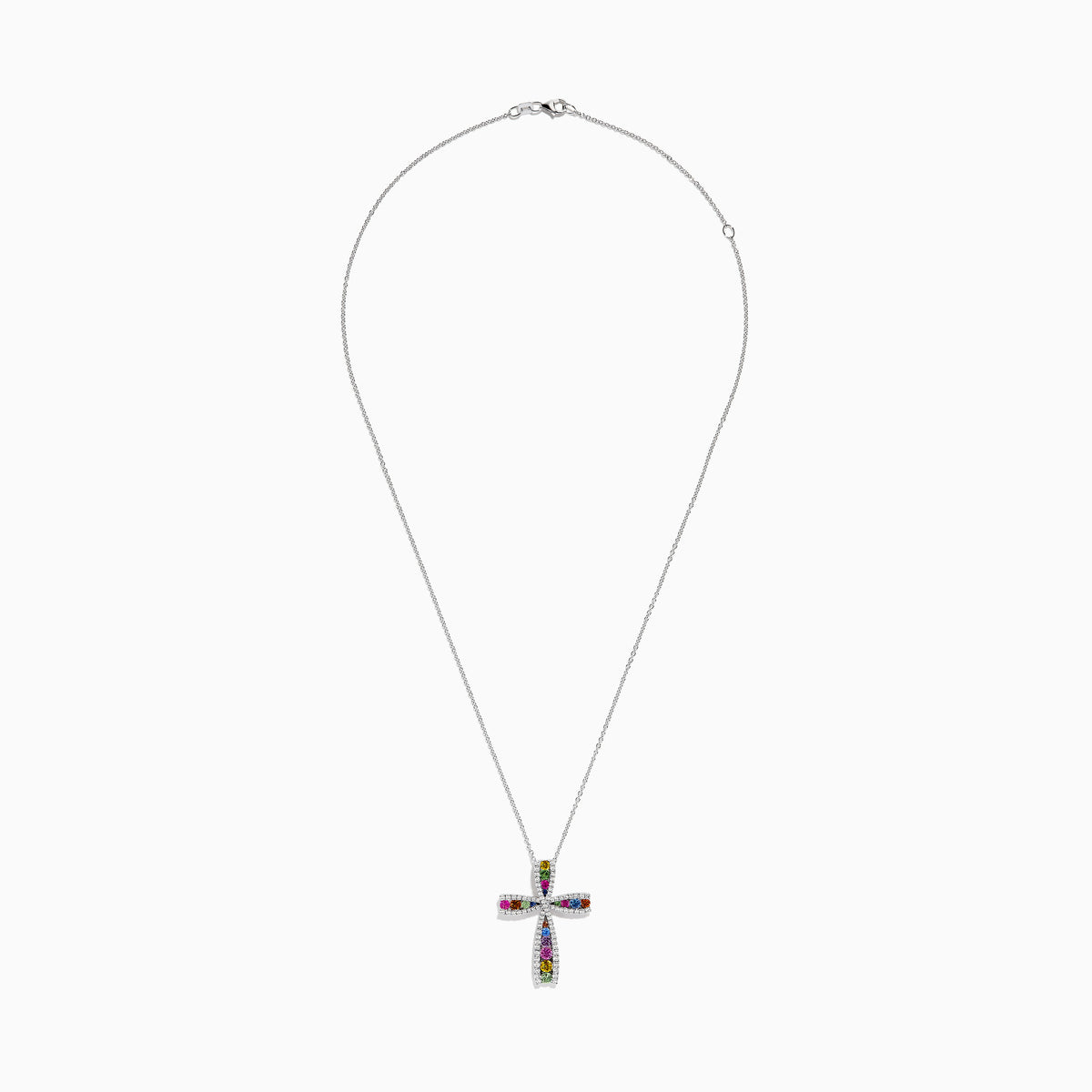 The Watercolors 14K White Gold Multi Sapphire and Diamond Cross Pendant shines on a white gold chain, featuring vibrant sapphires and sparkling diamonds, shown against a white background.