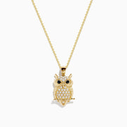 The Safari 14K Yellow Gold Black and White Diamond Owl Pendant features clear stones with black and white diamond eyes, all on a delicate gold chain.