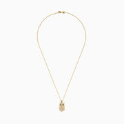 The Safari 14K Yellow Gold Black and White Diamond Owl Pendant features clear stones with black and white diamond eyes, all on a delicate gold chain.