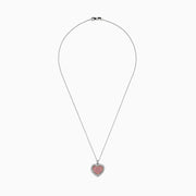 The 18K Two-Tone Gold White and Pink Diamond Heart Pendant features pink diamonds at the center, accented by a border of sparkling white diamonds for a stunning look.