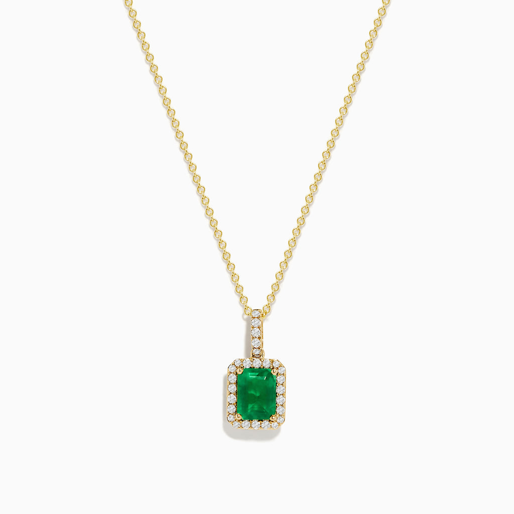 The 14K Yellow Gold Diamond and Emerald Pendant showcases a rectangular green emerald set in yellow gold, accented by small clear diamonds.